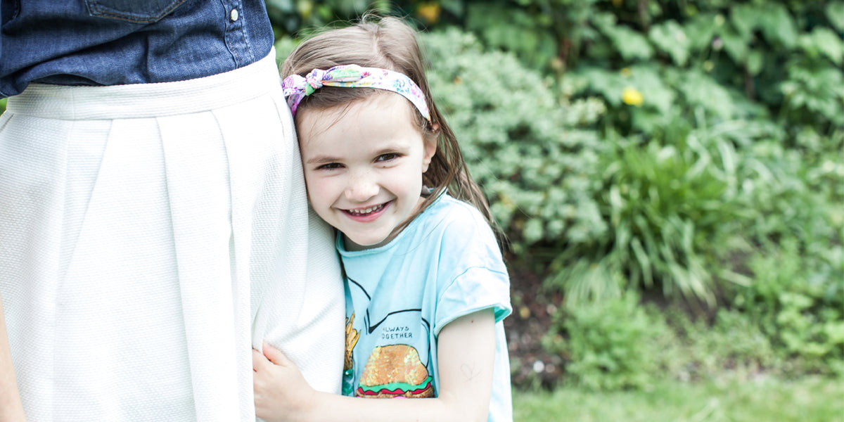 a-little-girl-hugging-her-mum