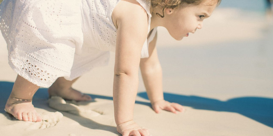 a-little-girl-on-the-sand