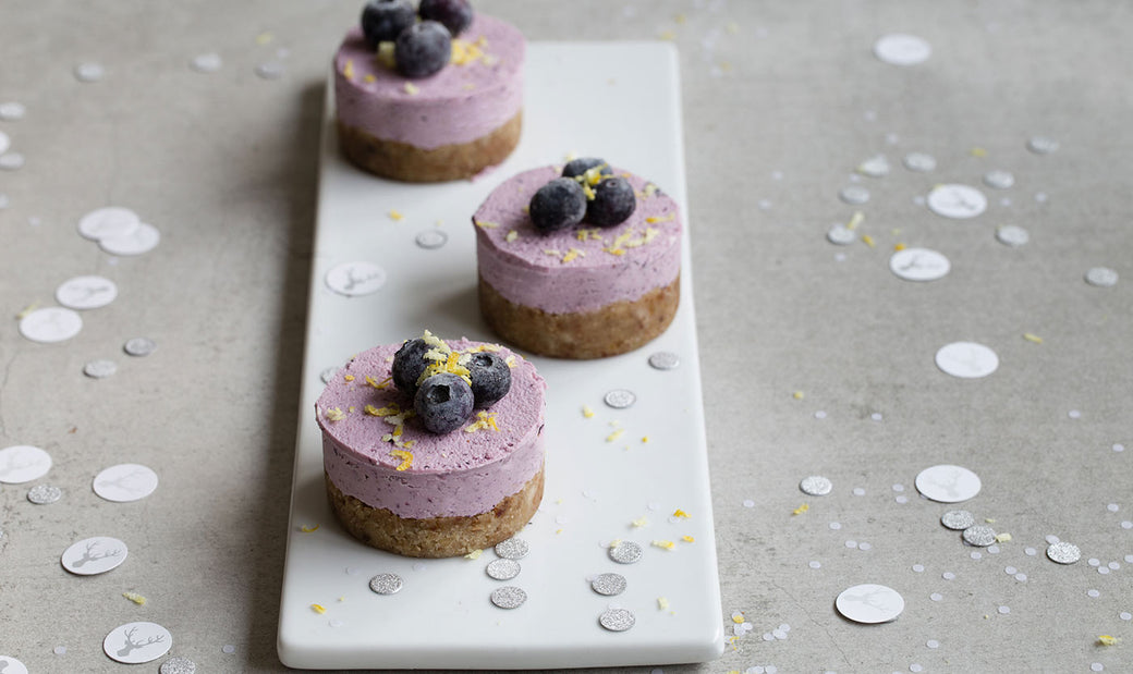 Mini raw blueberry and macadamia cheesecakes