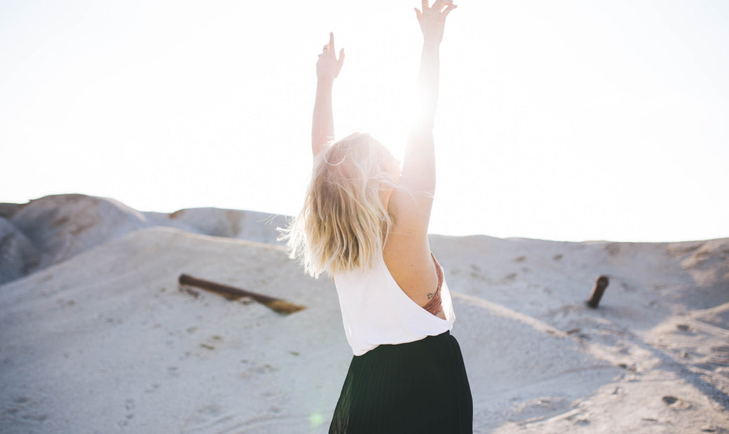 A happy woman in the sunshine