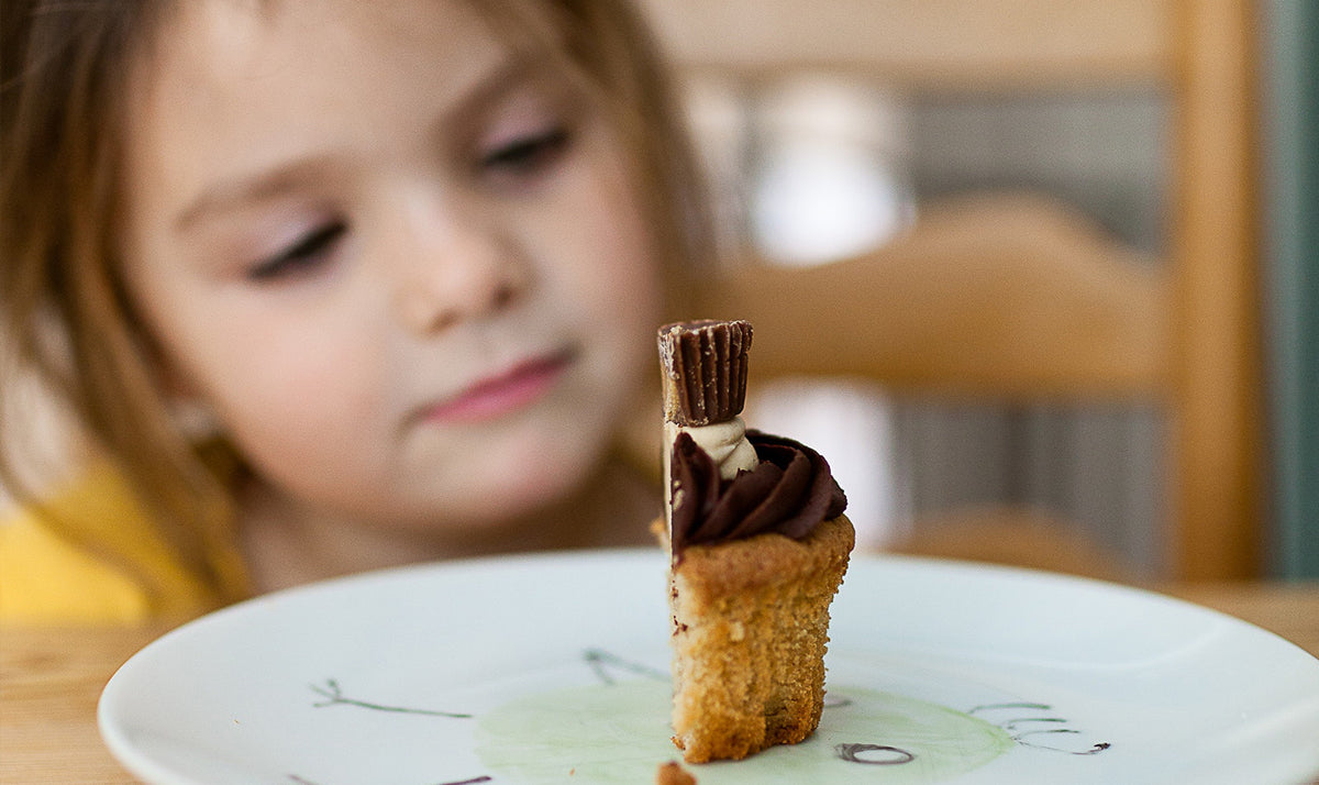 bare-biology-omega-3-a-little-girl-looking-a-cupcake