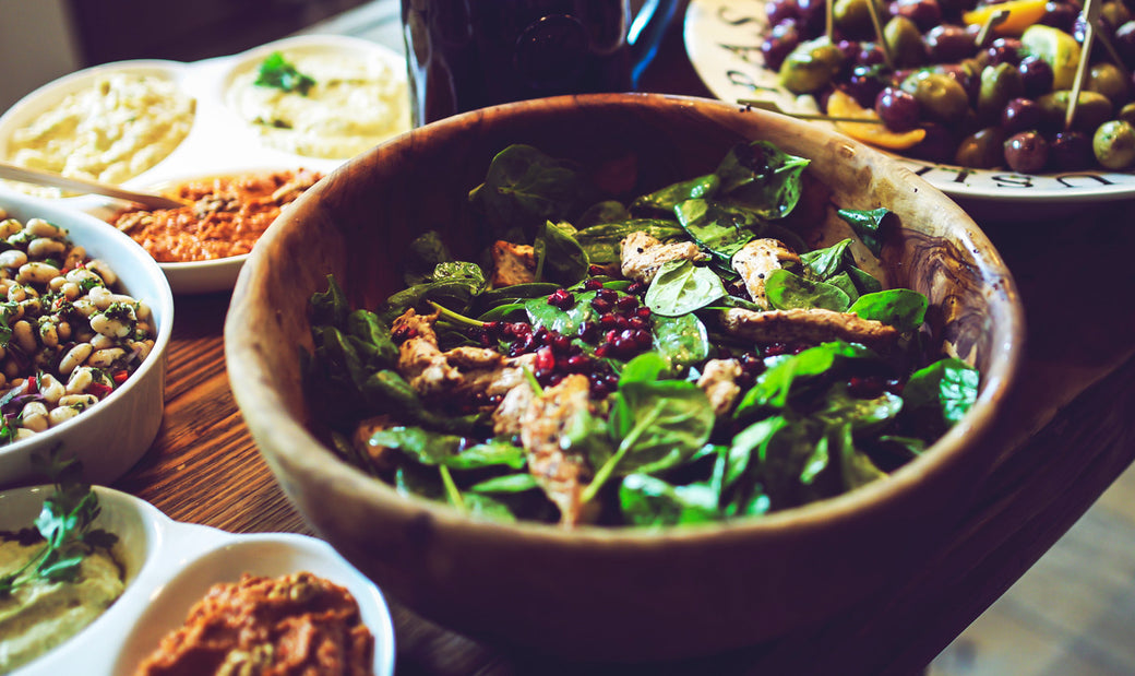 A variety of salads on a table