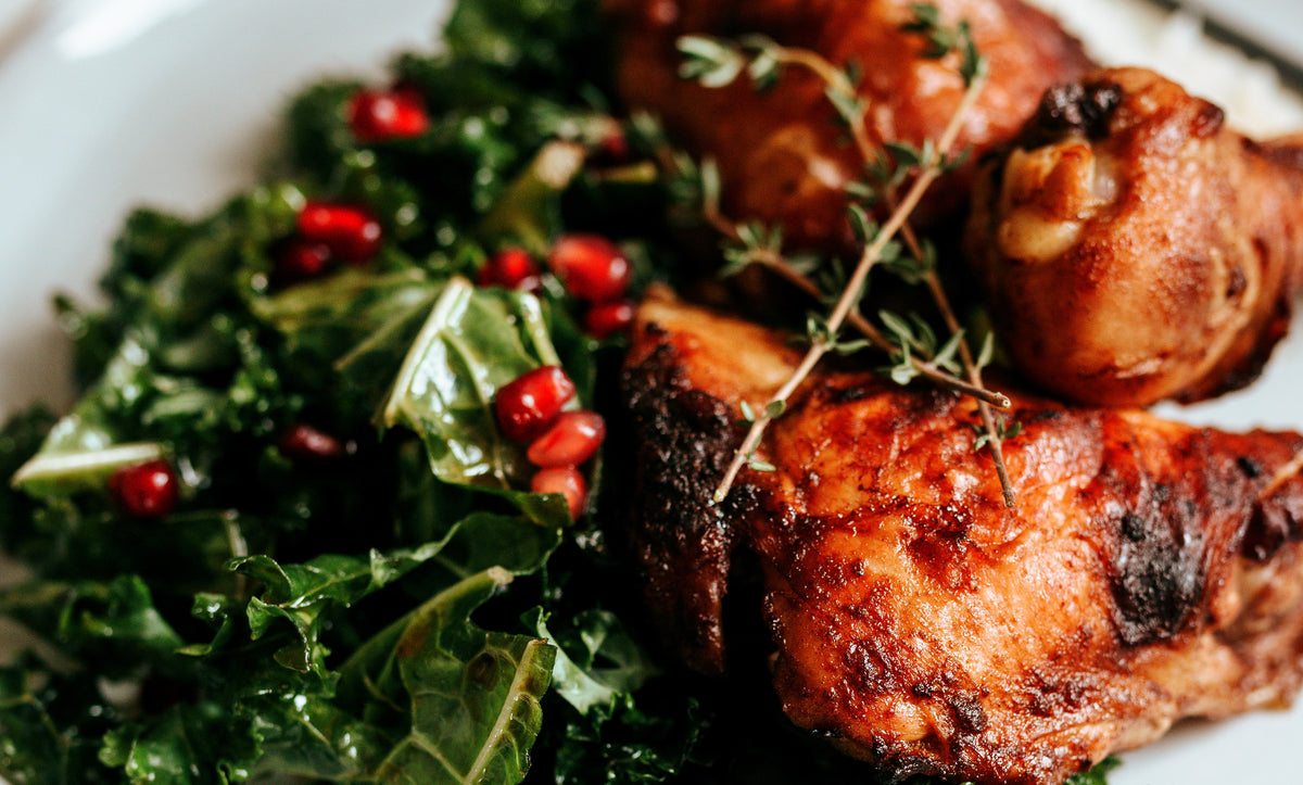 a protein salad with chicken and leafy greens