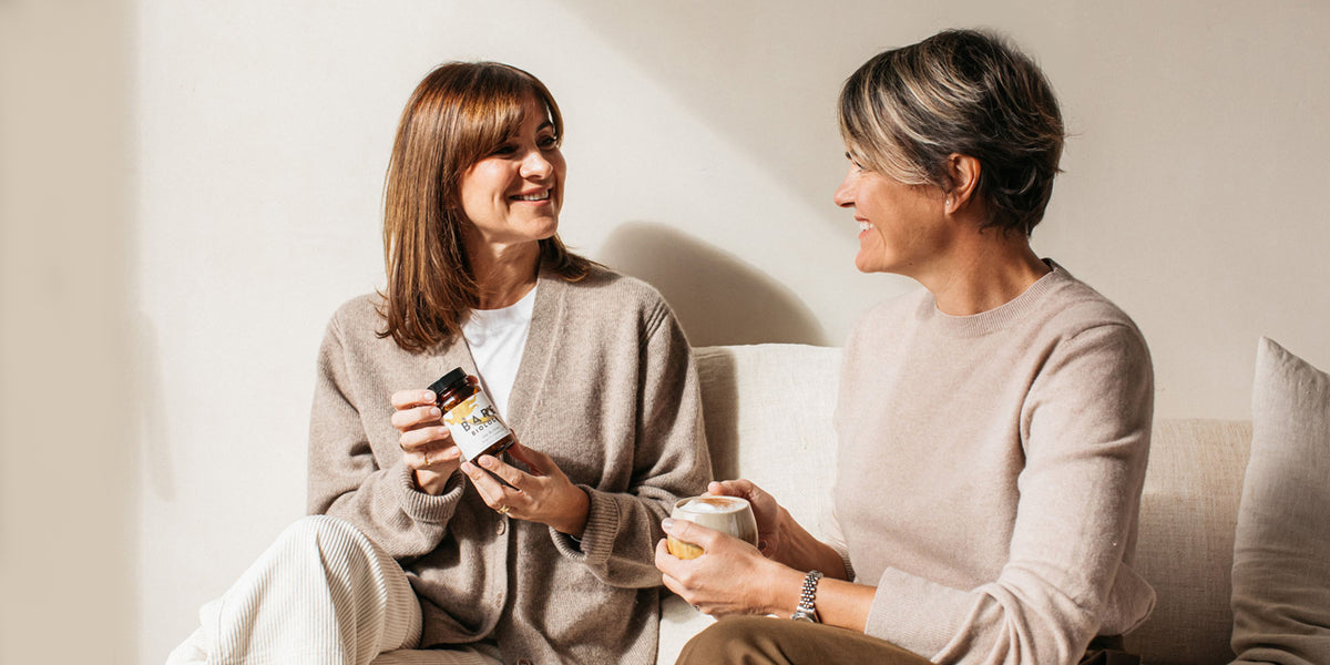 melanie-and-jayne-holding-rise-and-shine-capsules