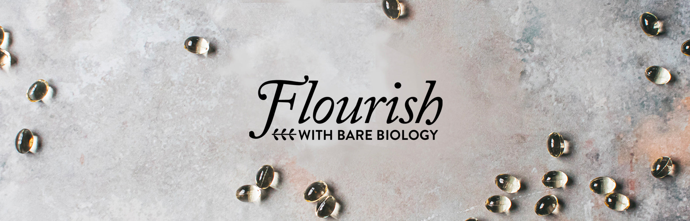 Bare Biology Flourish logo on a marbled grey background with little omega-3 capsules