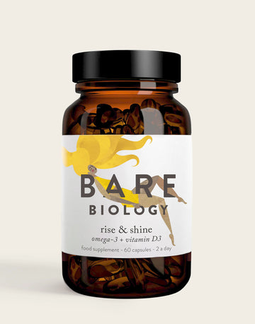 The Rise & Shine Omega-3 Plus Vitamin D3 Capsules by Bare Biology features a label with a yellow illustration of a person. This health and immunity supplement contains 60 capsules, rich in omega-3 and vitamin D3, suitable for twice-daily intake.